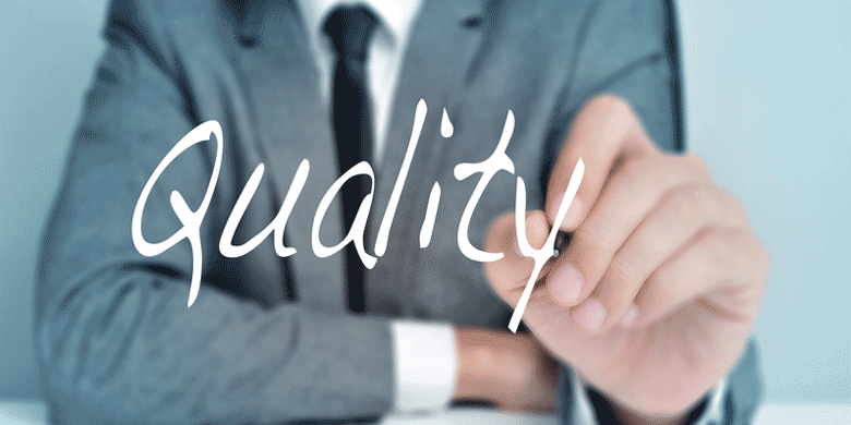 man writing quality sign man writing quality sign