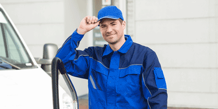 workman wearing a cap