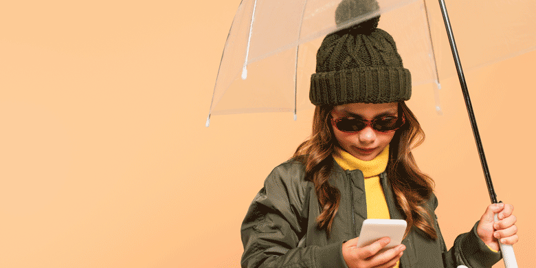 trendy girl holding umbrella