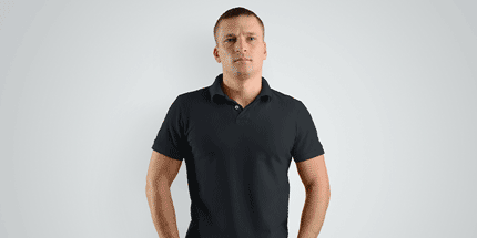 man wearing plain black polo shirt
