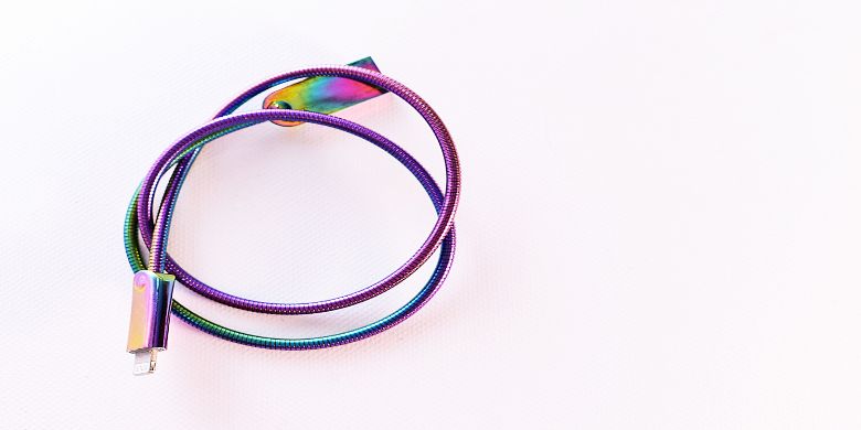 A multicoloured USB cable in a loop
