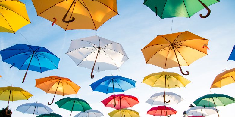 Colourful umbrellas in the sky.