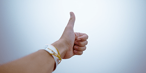 A thumbs up conveying positivity