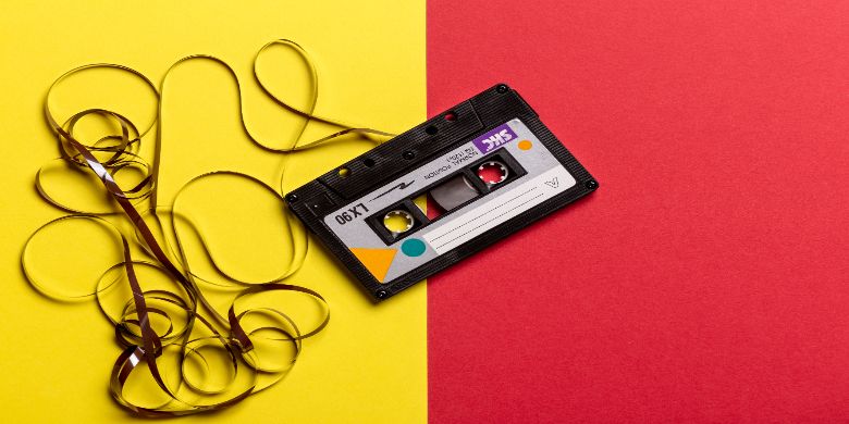 A cassette tape used to backup/hold data or music.