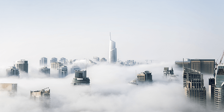 A foggy view of a city skyline