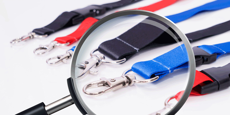 lanyards behind a magnifying glass