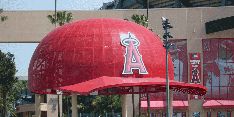 big cap at a baseball stadium