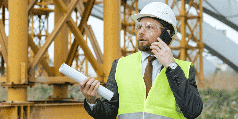 foreman wearing a hivis vest