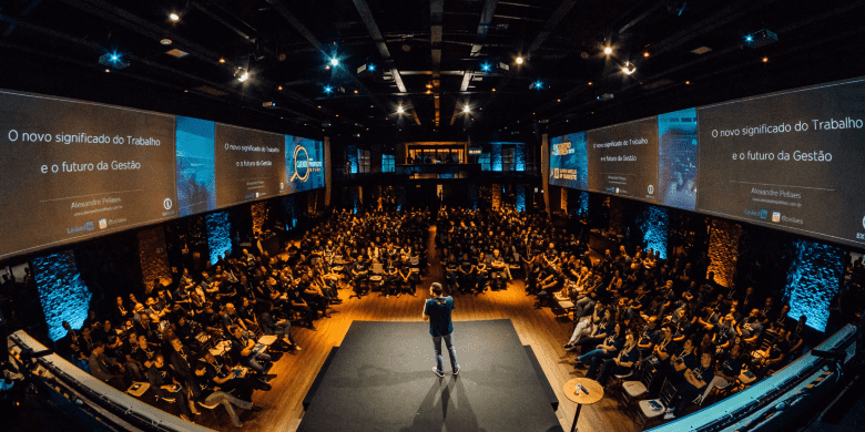 man speaking at conference