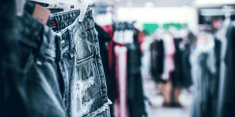 jeans on clothing rack