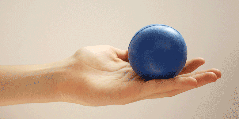 blue stressball on palm of hand