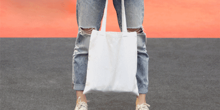woman holding a tote bag