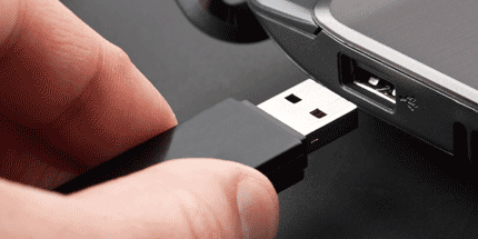 black usb being plugged in