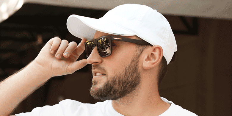 man wearing white unbranded cap