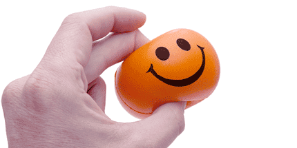 squeezing smiley stress balls