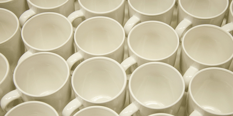 many white porcelain mugs