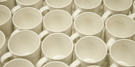 many white porcelain mugs