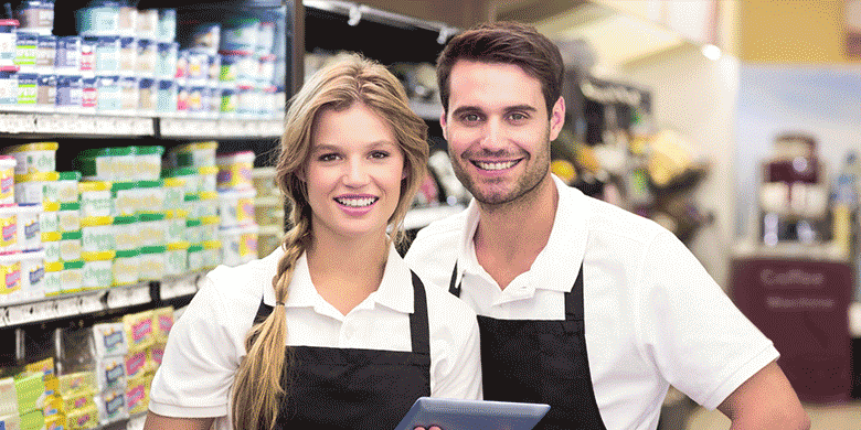 happy workers wearing polos