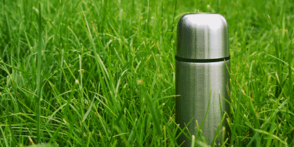 vacuum flask on grass