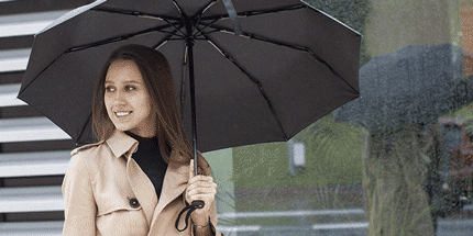 woman holding umbrella