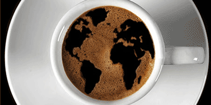 world map on cup of coffee