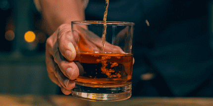 pouring whiskey
